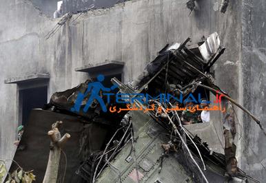  تصاویر سقوط هواپیمای اندونزی وسط شهر